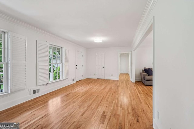1501 Memory Ln SE, Smyrna, GA 30080 - unfurnished room featuring healthy amount of natural light, light wood-style floors, and crown molding