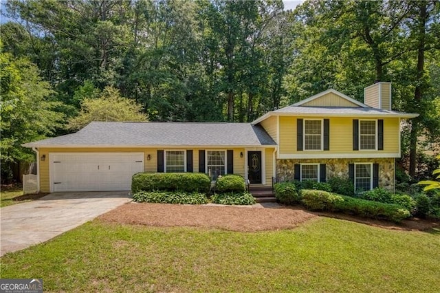 9685 Cone Ct, Roswell, GA 30075 - tri-level home featuring driveway, a front lawn, a chimney, an attached garage, and stone siding