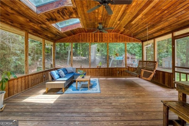 9685 Cone Ct, Roswell, GA 30075 - unfurnished sunroom featuring a skylight, ceiling fan, lofted ceiling, outdoor lounge area, and plenty of natural light