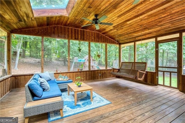 9685 Cone Ct, Roswell, GA 30075 - sunroom with an outdoor hangout area, vaulted ceiling, ceiling fan, and a skylight
