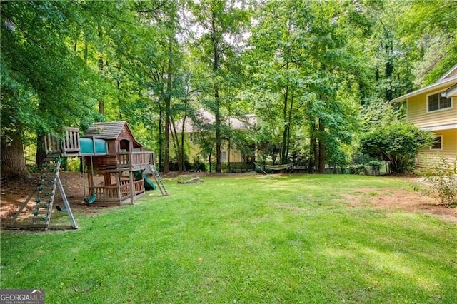 9685 Cone Ct, Roswell, GA 30075 - view of grassy yard with a playground