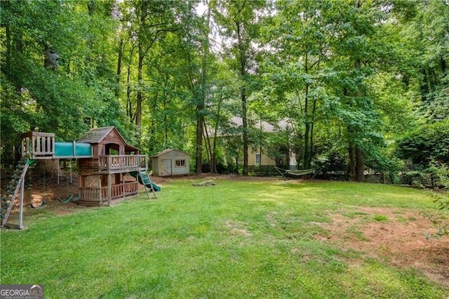 9685 Cone Ct, Roswell, GA 30075 - view of grassy yard with a playground and a shed