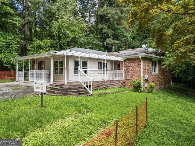 265 Mayfield Rd, Alpharetta, GA 30009 - view of front facade featuring covered porch, brick siding, and asphalt driveway