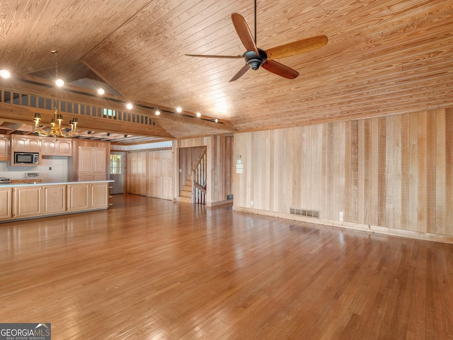 210 Roberts Point Rd, Jackson, GA 30233 - unfurnished living room featuring wood ceiling, lofted ceiling, ceiling fan, a chandelier, and wood finished floors