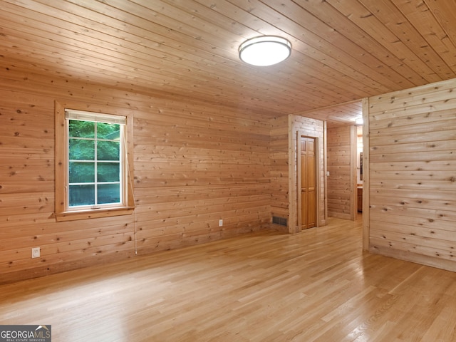 210 Roberts Point Rd, Jackson, GA 30233 - spare room featuring wood walls, wooden ceiling, and wood finished floors