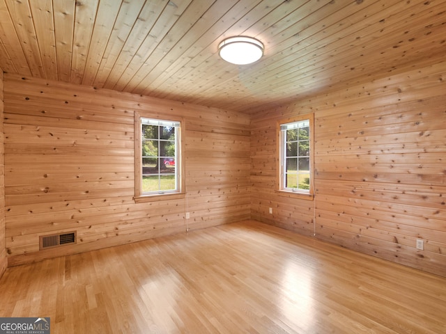 210 Roberts Point Rd, Jackson, GA 30233 - spare room with a relaxing sauna, plenty of natural light, wood ceiling, wood walls, and wood finished floors