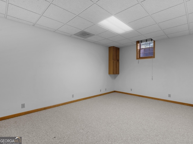210 Roberts Point Rd, Jackson, GA 30233 - below grade area featuring light carpet and a paneled ceiling