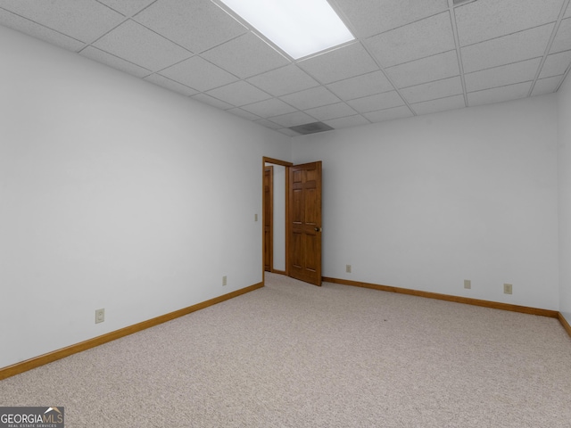 210 Roberts Point Rd, Jackson, GA 30233 - carpeted spare room featuring a paneled ceiling and baseboards