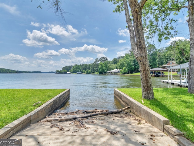 210 Roberts Point Rd, Jackson, GA 30233 - dock area featuring a boat ramp, a water view, and a lawn