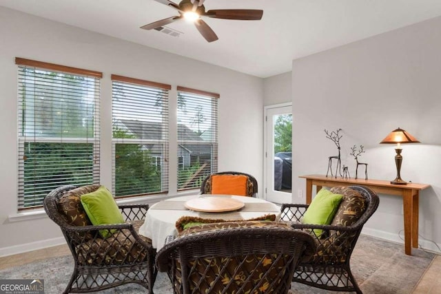 7430 Ramsgate Ct, Cumming, GA 30040 - living area with ceiling fan and baseboards
