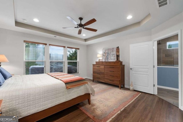 7430 Ramsgate Ct, Cumming, GA 30040 - bedroom featuring a raised ceiling, wood finished floors, recessed lighting, and ceiling fan