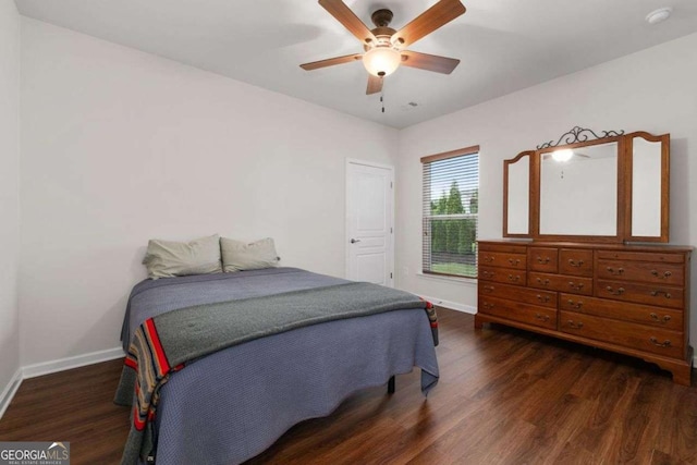 7430 Ramsgate Ct, Cumming, GA 30040 - bedroom with wood finished floors and ceiling fan