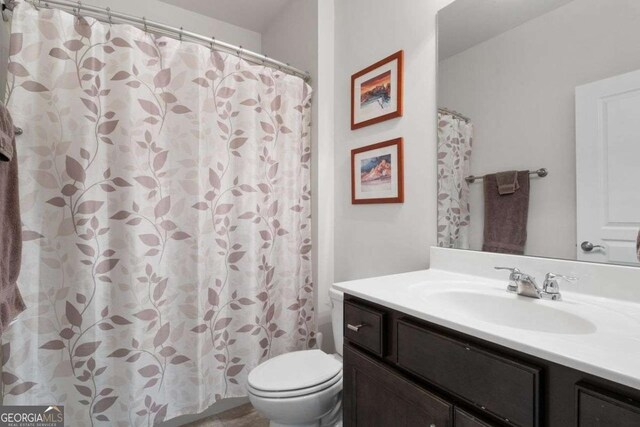 7430 Ramsgate Ct, Cumming, GA 30040 - full bath with vanity and curtained shower