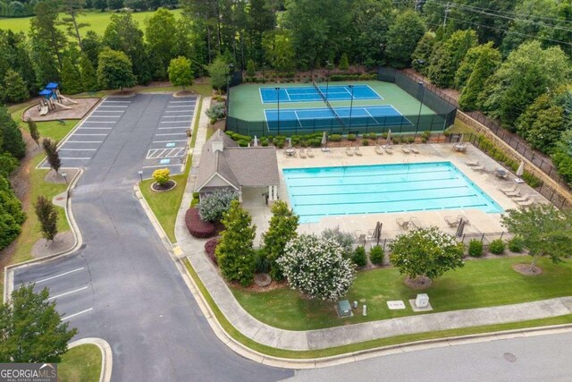 7430 Ramsgate Ct, Cumming, GA 30040 - drone / aerial view of a pool