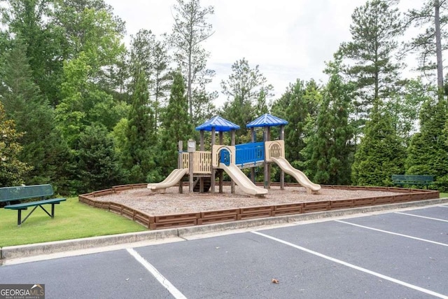 7430 Ramsgate Ct, Cumming, GA 30040 - community jungle gym featuring a lawn