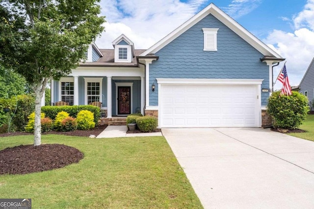 7430 Ramsgate Ct, Cumming, GA 30040 - view of front facade with concrete driveway, a front lawn, and a porch