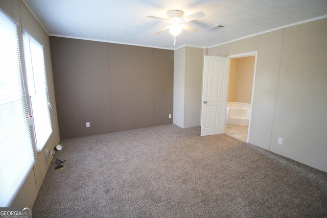 447 Smith Rd, Defuniak Springs, FL 32433 - carpeted spare room featuring crown molding and ceiling fan