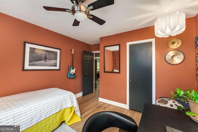2468 Fallview Ter, Atlanta, GA 30344 - bedroom featuring light wood-type flooring and a ceiling fan