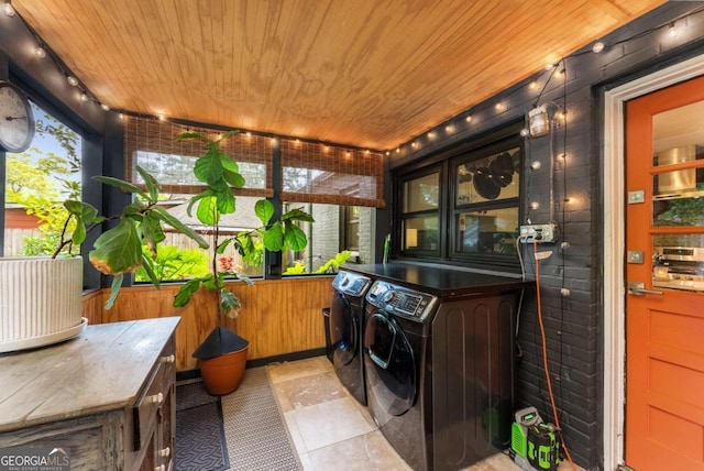 2468 Fallview Ter, Atlanta, GA 30344 - laundry area featuring washing machine and dryer, wooden ceiling, and rail lighting