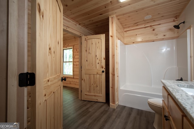 155 Stonecrest Ln, Murphy, NC 28906 - full bath with wood ceiling, vanity, wood finished floors, wood walls, and shower / washtub combination