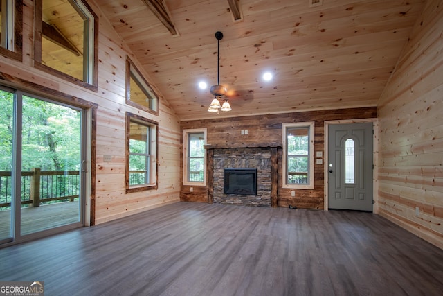 155 Stonecrest Ln, Murphy, NC 28906 - unfurnished living room with wooden walls, wood finished floors, wood ceiling, a stone fireplace, and high vaulted ceiling