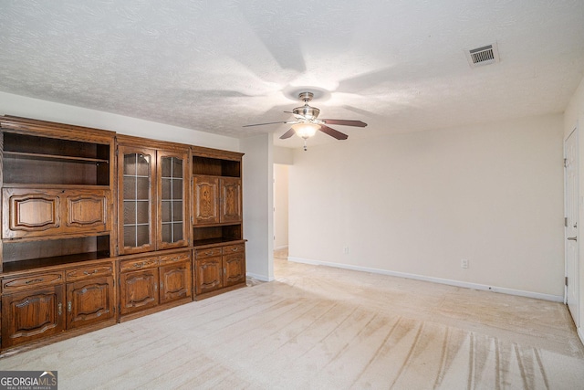 40 Browning Dr, Covington, GA 30016 - unfurnished room featuring ceiling fan, light carpet, and a textured ceiling