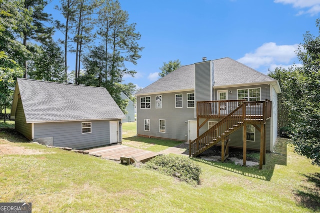 40 Browning Dr, Covington, GA 30016 - back of house with a wooden deck, a yard, stairs, and roof with shingles