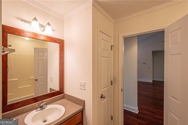 118 High Ridge Ln, Dahlonega, GA 30533 - bathroom with vanity, wood finished floors, and ornamental molding