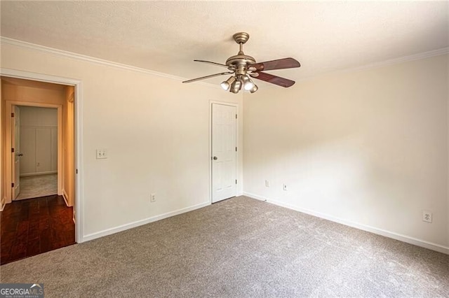 118 High Ridge Ln, Dahlonega, GA 30533 - unfurnished room with dark colored carpet, a ceiling fan, and crown molding