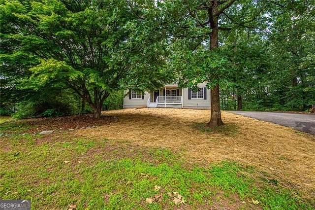 118 High Ridge Ln, Dahlonega, GA 30533 - view of property hidden behind natural elements featuring covered porch and a front lawn
