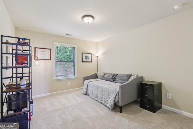 532 Lemon St NE, Marietta, GA 30060 - bedroom featuring light carpet and baseboards