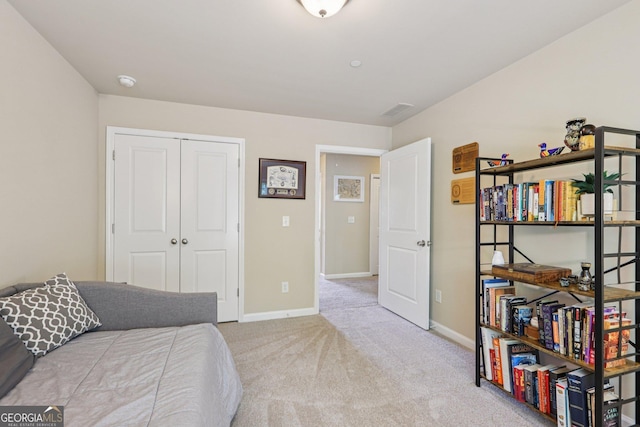 532 Lemon St NE, Marietta, GA 30060 - bedroom with carpet floors and a closet