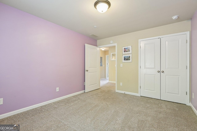 532 Lemon St NE, Marietta, GA 30060 - unfurnished bedroom with carpet floors and a closet
