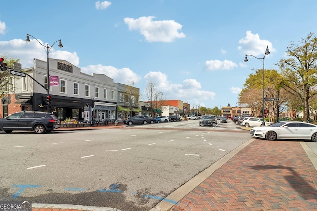 532 Lemon St NE, Marietta, GA 30060 - view of asphalt road with street lights, curbs, and sidewalks