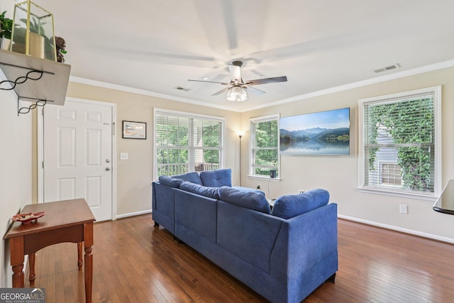 532 Lemon St NE, Marietta, GA 30060 - living room featuring dark wood-type flooring, a ceiling fan, and crown molding