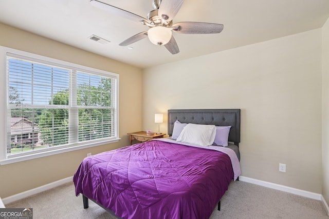 532 Lemon St NE, Marietta, GA 30060 - carpeted bedroom featuring baseboards and a ceiling fan