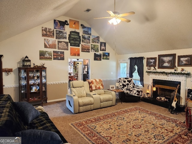 115 Settlers Trl, Warner Robins, GA 31088 - carpeted living room with ceiling fan, a fireplace, a textured ceiling, and high vaulted ceiling