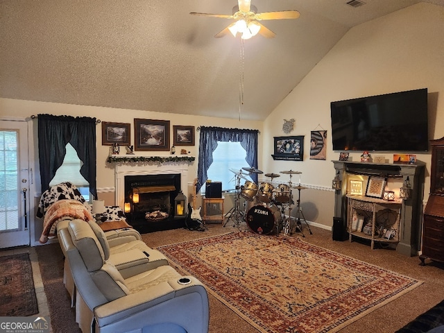 115 Settlers Trl, Warner Robins, GA 31088 - living area featuring ceiling fan, vaulted ceiling, a fireplace with flush hearth, and carpet flooring