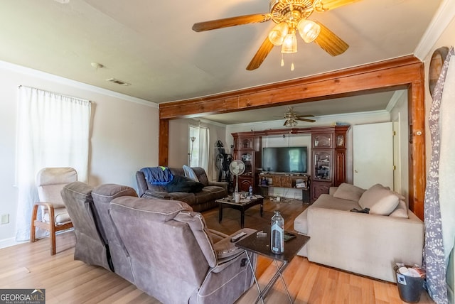 1115 W 51st St, Savannah, GA 31405 - living area featuring a ceiling fan, crown molding, and light wood-type flooring