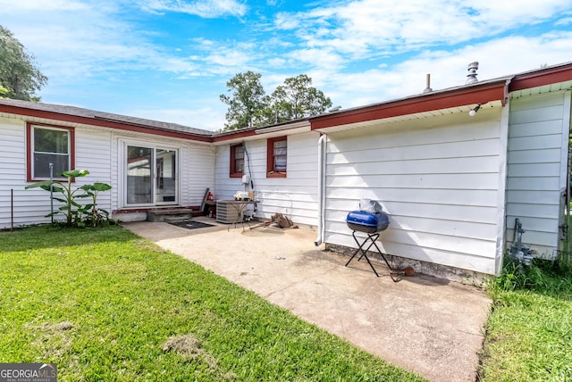 1115 W 51st St, Savannah, GA 31405 - back of house with a patio area and a yard
