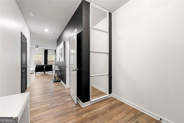 4992 Lower Elm, Atlanta, GA 30349 - corridor featuring light wood finished floors and recessed lighting