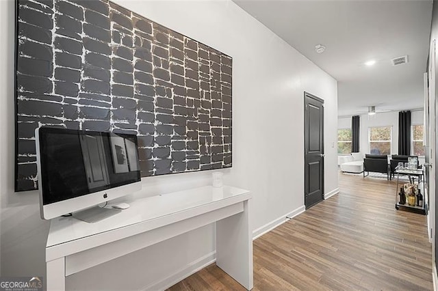 4992 Lower Elm, Atlanta, GA 30349 - hallway with wood finished floors and baseboards