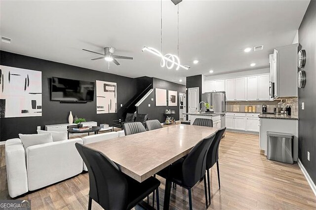 4992 Lower Elm, Atlanta, GA 30349 - dining space with recessed lighting, light wood-type flooring, and a ceiling fan