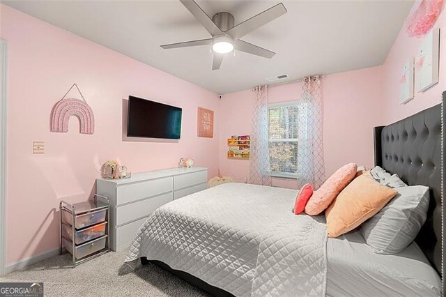 4992 Lower Elm, Atlanta, GA 30349 - bedroom featuring light colored carpet and a ceiling fan