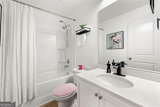 4992 Lower Elm, Atlanta, GA 30349 - full bathroom with vanity and shower / bath combo with shower curtain