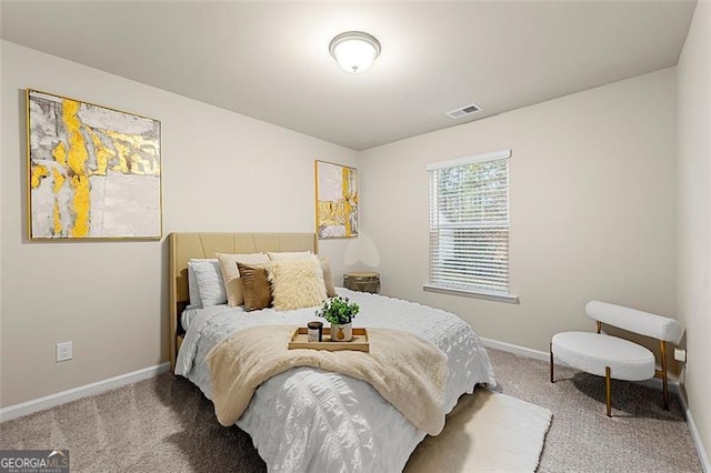 4992 Lower Elm, Atlanta, GA 30349 - carpeted bedroom featuring baseboards