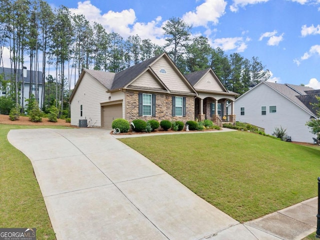 6460 Valley Crossing Way, Cumming, GA 30028 - craftsman inspired home with concrete driveway, a front lawn, stone siding, a porch, and an attached garage