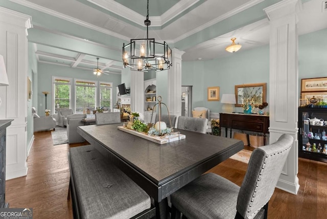 6460 Valley Crossing Way, Cumming, GA 30028 - dining area featuring ornate columns, dark wood-style flooring, a ceiling fan, a chandelier, and ornamental molding