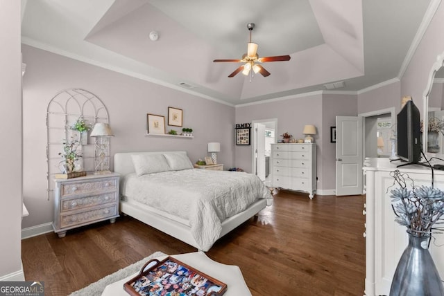 6460 Valley Crossing Way, Cumming, GA 30028 - bedroom with a raised ceiling, dark wood-style flooring, a ceiling fan, and ornamental molding