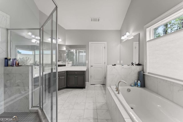 6460 Valley Crossing Way, Cumming, GA 30028 - full bath with vanity, a bath, marble look tiles, and a stall shower